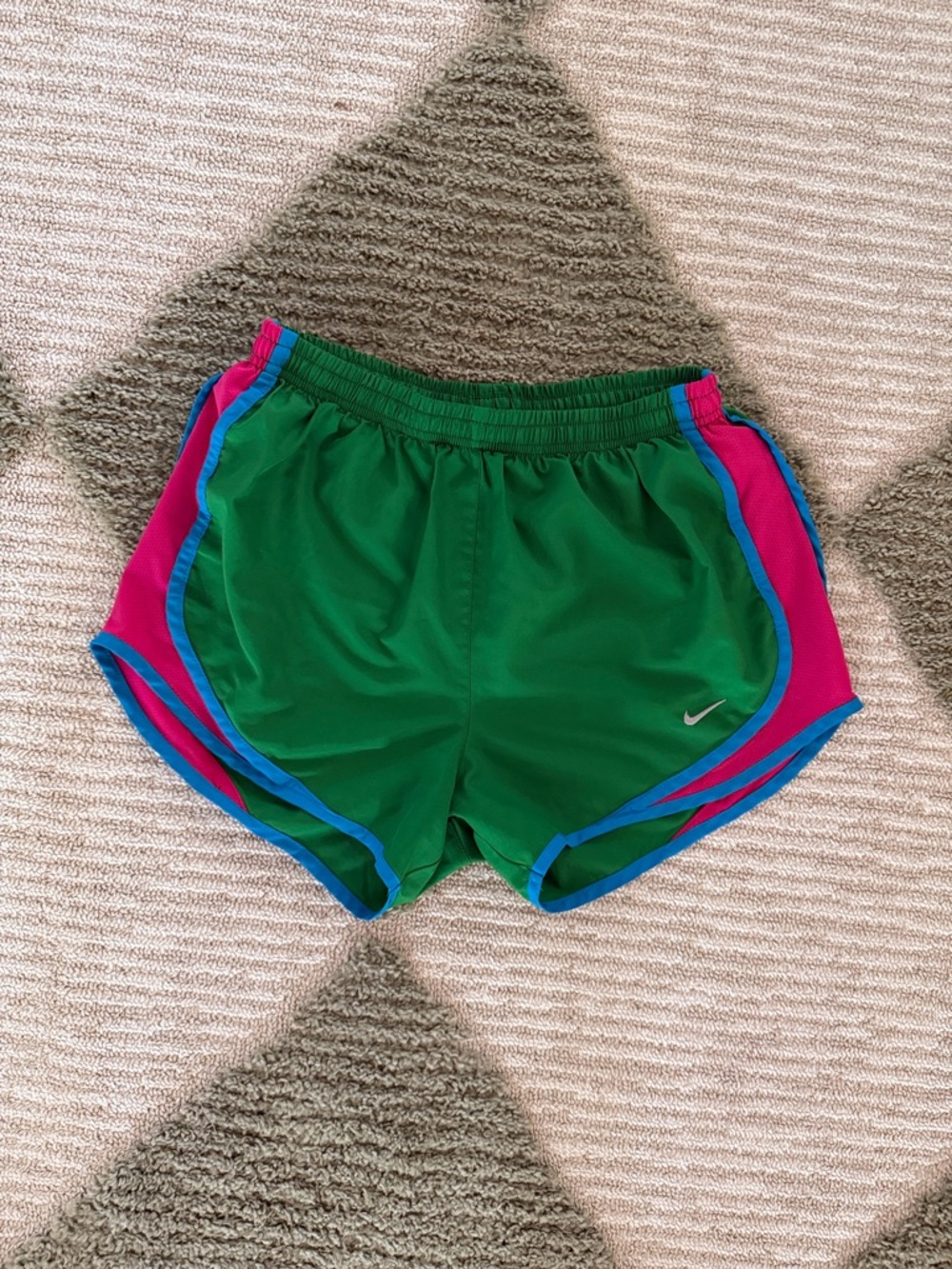 Nike Women's Green Athletic Shorts with Pink Panels and Blue Trim